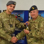 Flt Lt Powell receives the keys to the squadron from Sgt (ATC) Bairnsfather.